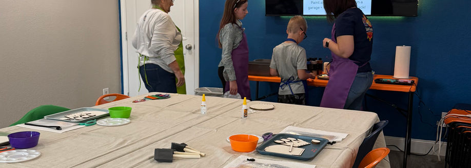 Kids and adult doing craft