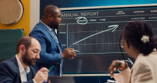chief-operating-officer-presenting-annual-data-reports-conference-room 1