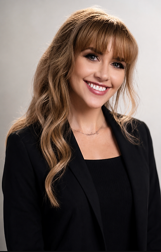 Professional portrait of Amber Bennett-Ford, Creative Director & Head of Brand at THE SIN® Productions.