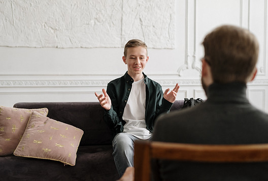 Two people in Counseling/Theray