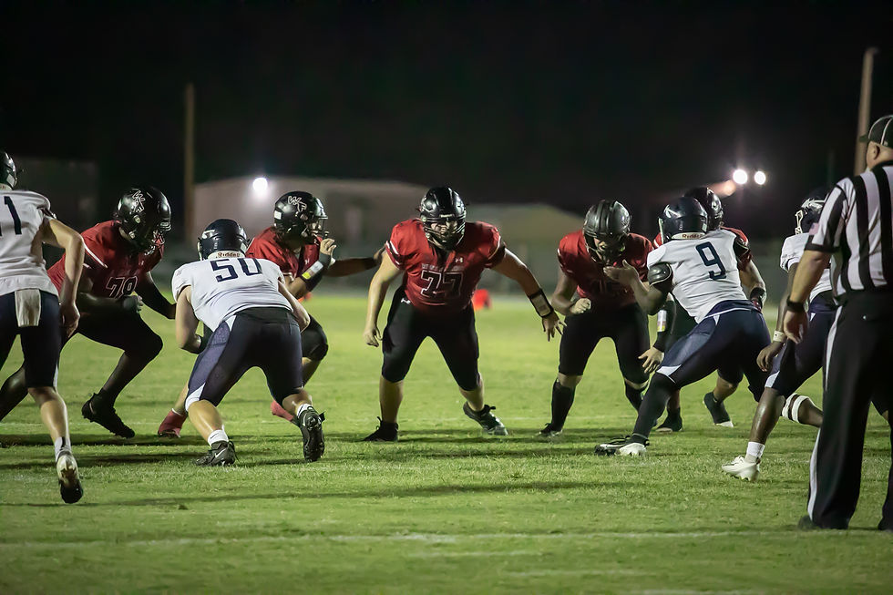 Offensive Line making the way for Benson to get the ball into the end zone for a touchdown