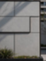Modern paver installation in Phoenix with gray wall panels
