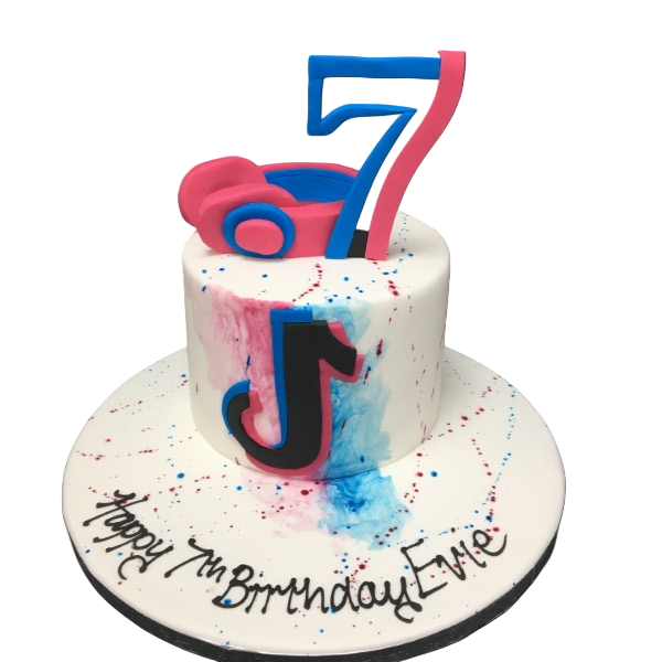 Bespoke cake with colorful icing and decorative swirls, perfect for celebration in Solihull, West Midlands.
