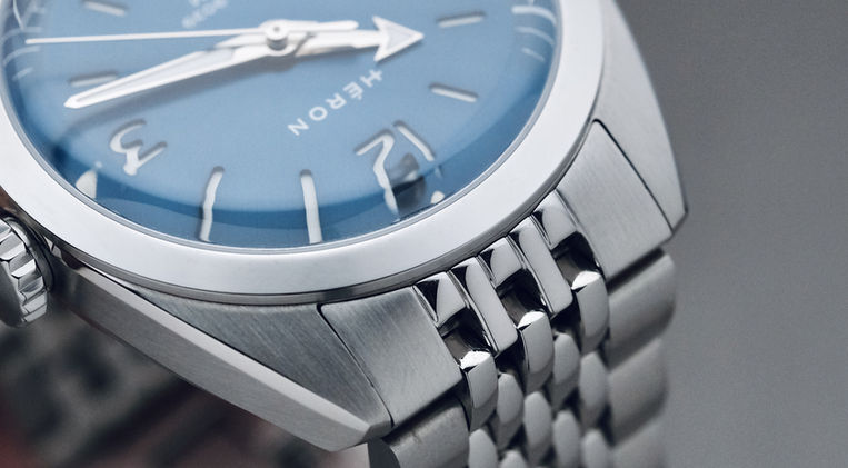 Heron Continental Blue_Ref. 5002-A Review Canadian Microbrand GADA Everyday Sports Watch Hardened Case Mainspring Watch Magazine