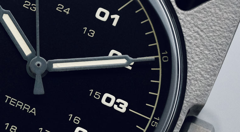 Delhi Watch Company Terra Titanium Field Watch Review Grade 2 Titanium Miyota Slim GL32 Mainspring Watch Magazine