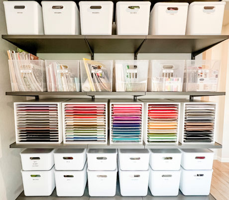 Craft room shelving organized with labeled bins and sorted paper storage by KO Luxury Organizing in Aurora, CO