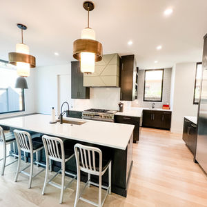 A beautifully organized kitchen with clear counters