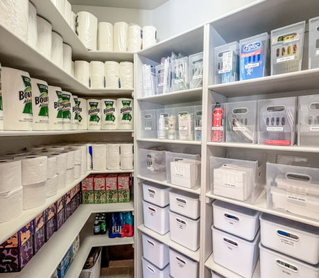 Storage room organized with labeled Target totes on heavy duty metal racks by KO Luxury Organizing in Golden, CO