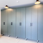 Gorgeous custom sage green floor to ceiling garage cabinetry done by KO Luxury Organizing with Closet Factory in Cherry Hills Village, CO.