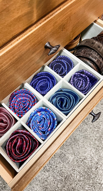 Men's ties organized in the Cambridge 8-section organizer from The Container Store. Cherry Hills Village, CO.