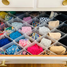 Underwear organized in clear drawer dividers