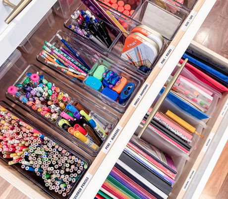 Kids' art supply drawers organized with clear dividers by KO Luxury Organizing in Boulder, CO