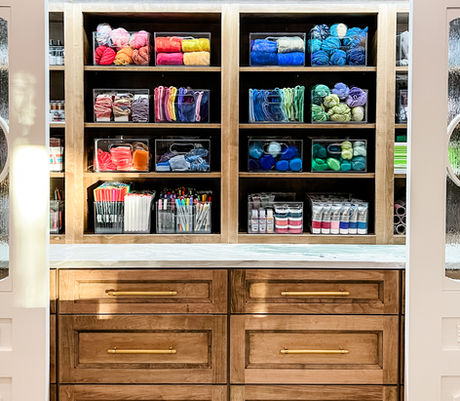 Yarn storage organized in The Home Edit All Purpose Bins a built-in craft cabinet by KO Luxury Organizing in Castle Pines, CO