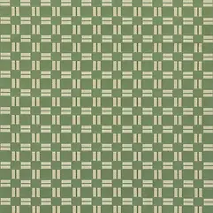 Close up of a rug with a green background and a repeating geometric pattern of cream and tan rectangular blocks.