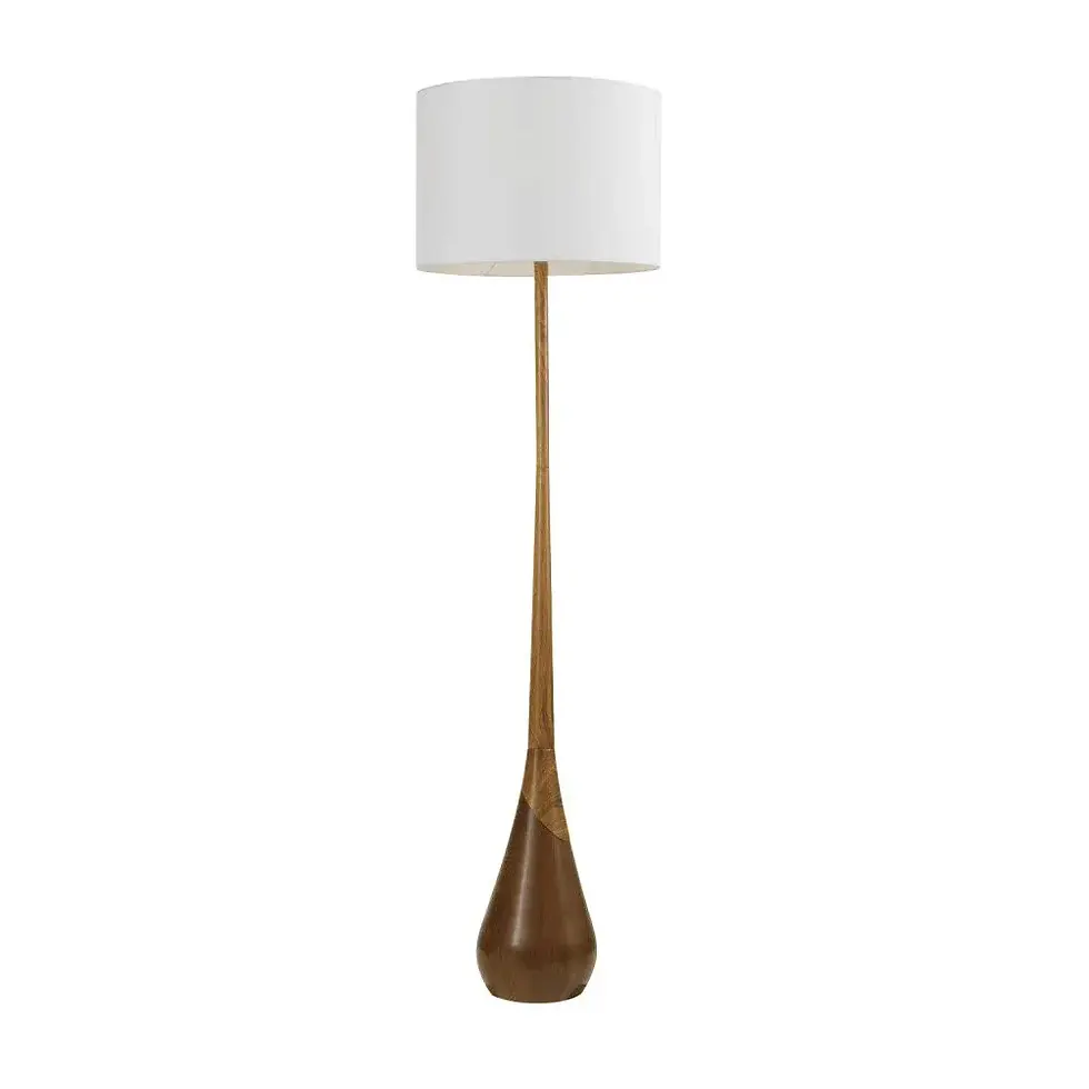 Floor lamp with a sculpted wood base and slender neck, topped with a large white cylindrical fabric shade.