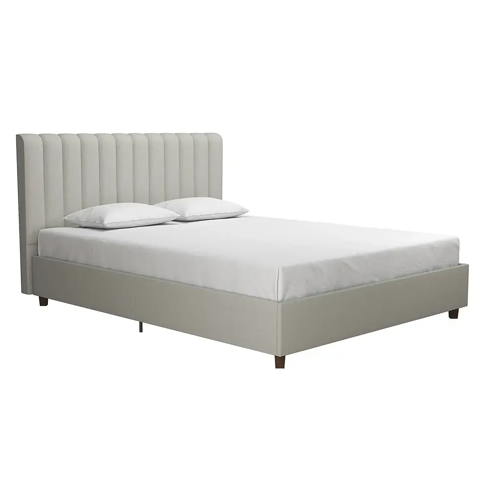 The Brittany Bed showcases a modern upholstered design with a grey frame and vertical tufted headboard.