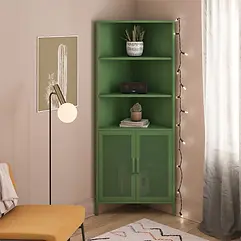 Green metal corner cabinet with closed mesh doors, featuring upper open shelves displaying books and decor.