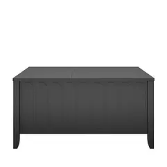 The black wooden desk has a rectangular top and panel design similar to the Her Majesty Lift Top Coffee Table.