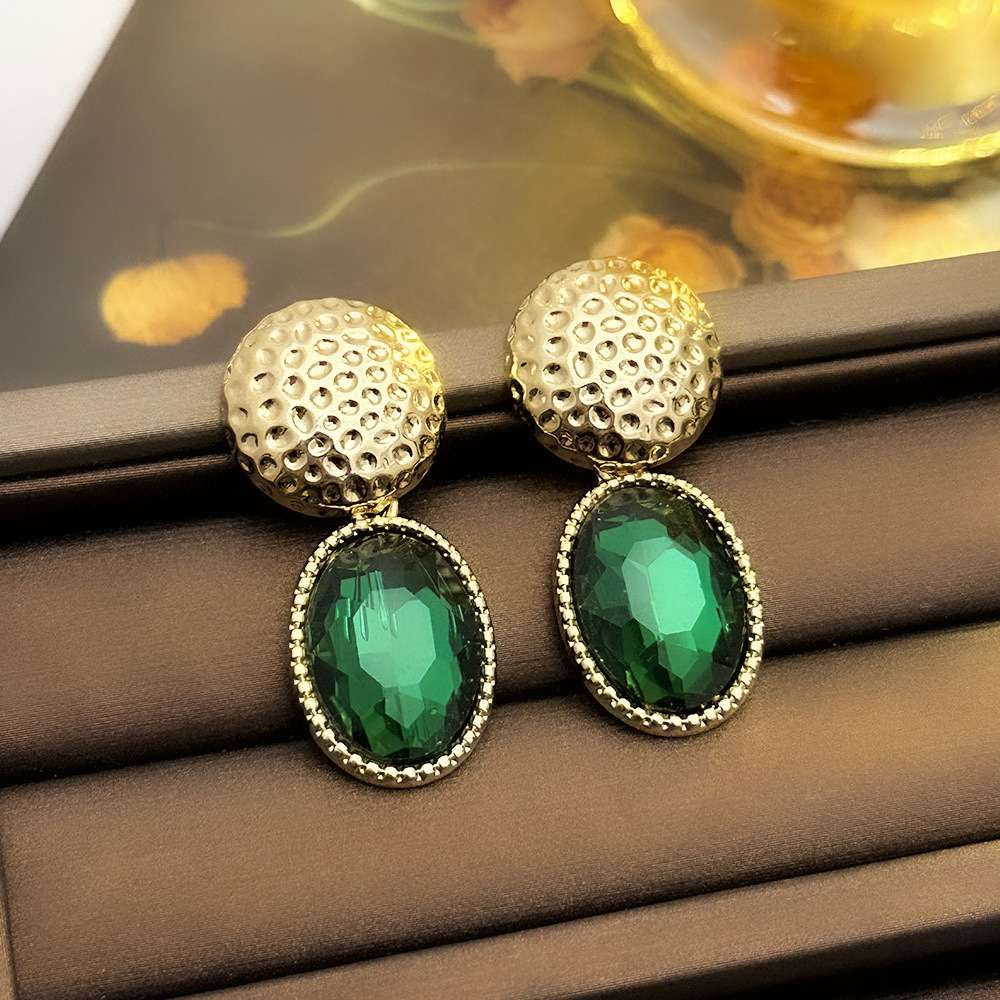 Luxury Emerald and Golden Dangle Earrings