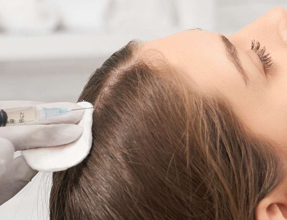 Close-up of a woman receiving a injection in her scalp.