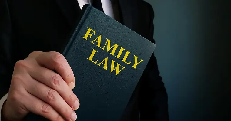 family-law-on-blue-book.webp