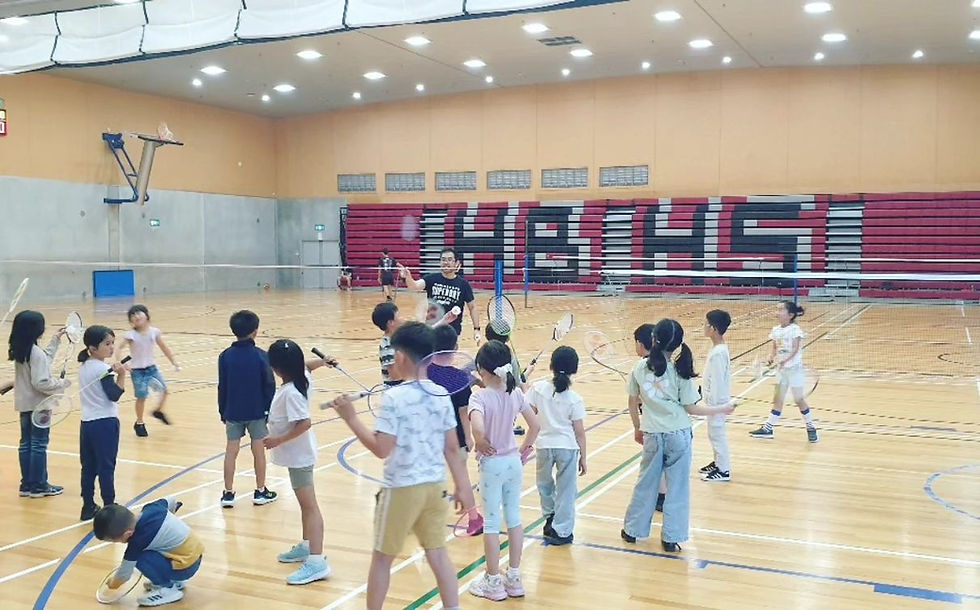 Eye-level view of a colorful community center playground in Hamilton with children playing