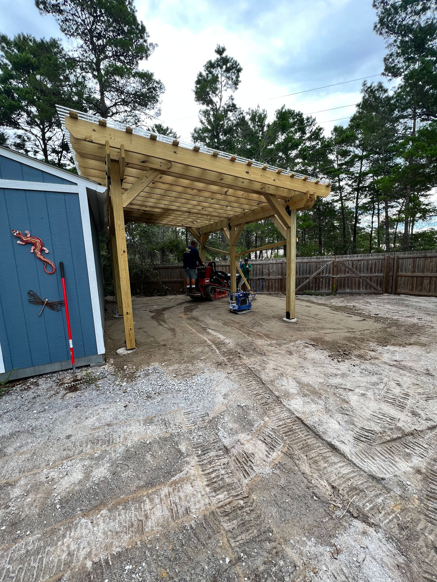 Luxury landscaping with sod, irrigation, artificial turf, pavers, and outdoor living by Turf Tailors in Santa Rosa Beach.