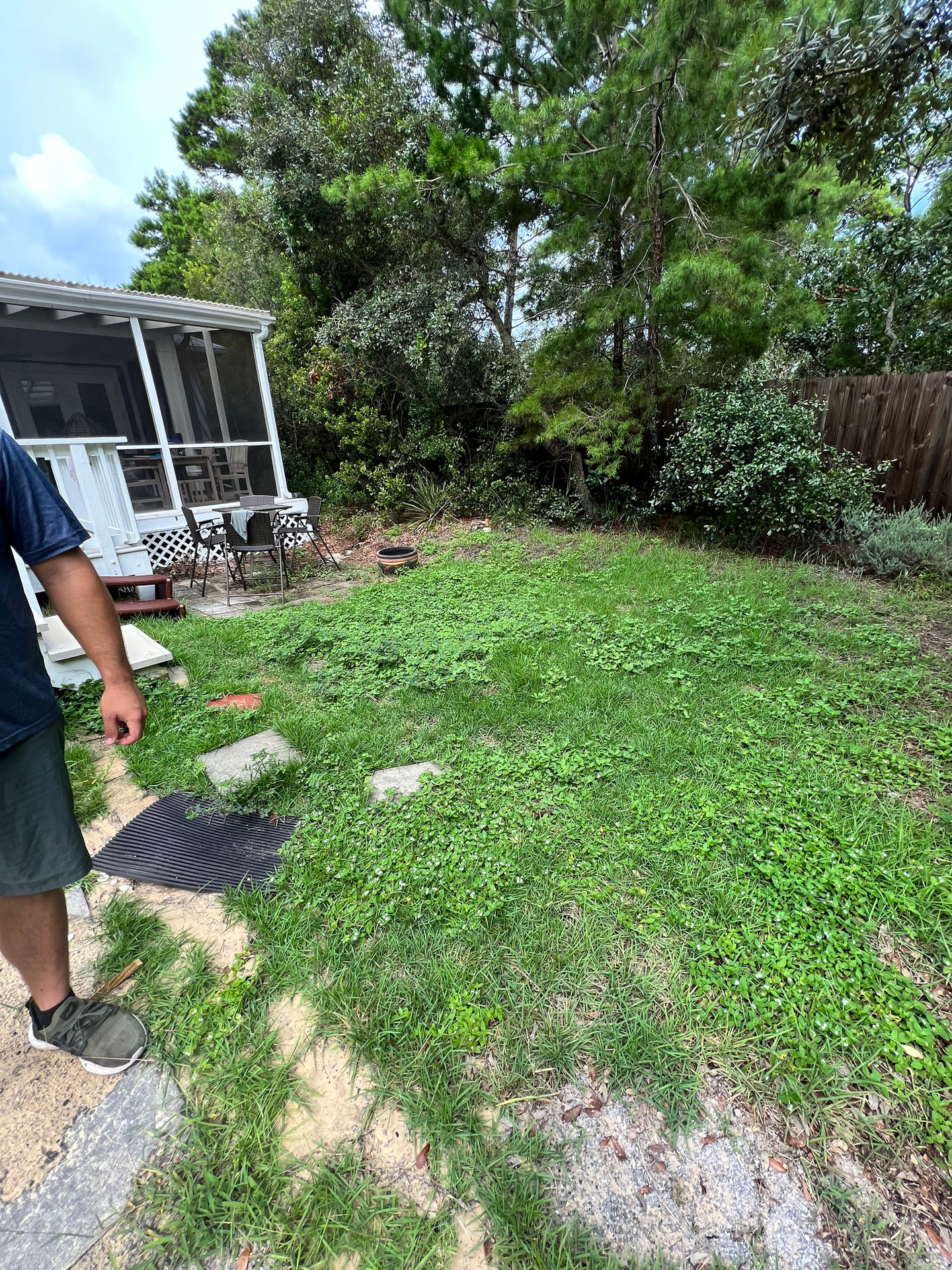 Luxury landscaping with sod, irrigation, artificial turf, pavers, and outdoor living by Turf Tailors in Santa Rosa Beach.