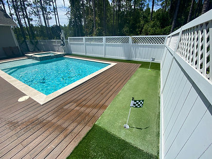 Luxury landscaping with sod, irrigation, artificial turf, pavers, and outdoor living by Turf Tailors in Fort Walton Beach, Destin, Santa Rosa beach, Niceville.