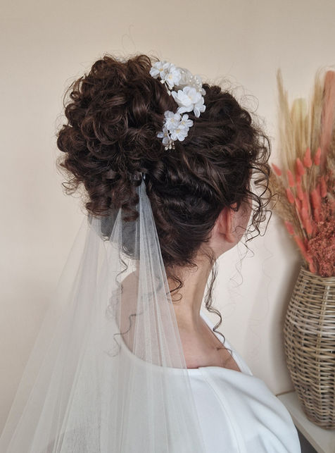 Natural Curl Bridal Bun by Brides By Rose