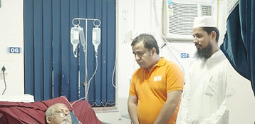 Doctor Talking to Boy in Wheelchair