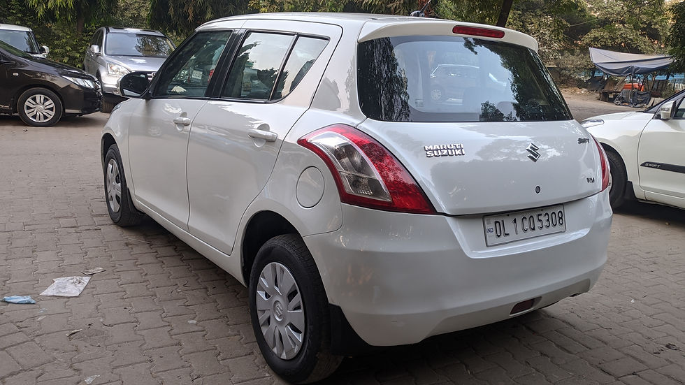 Thumbnail: Maruti Suzuki Swift VXi 2013