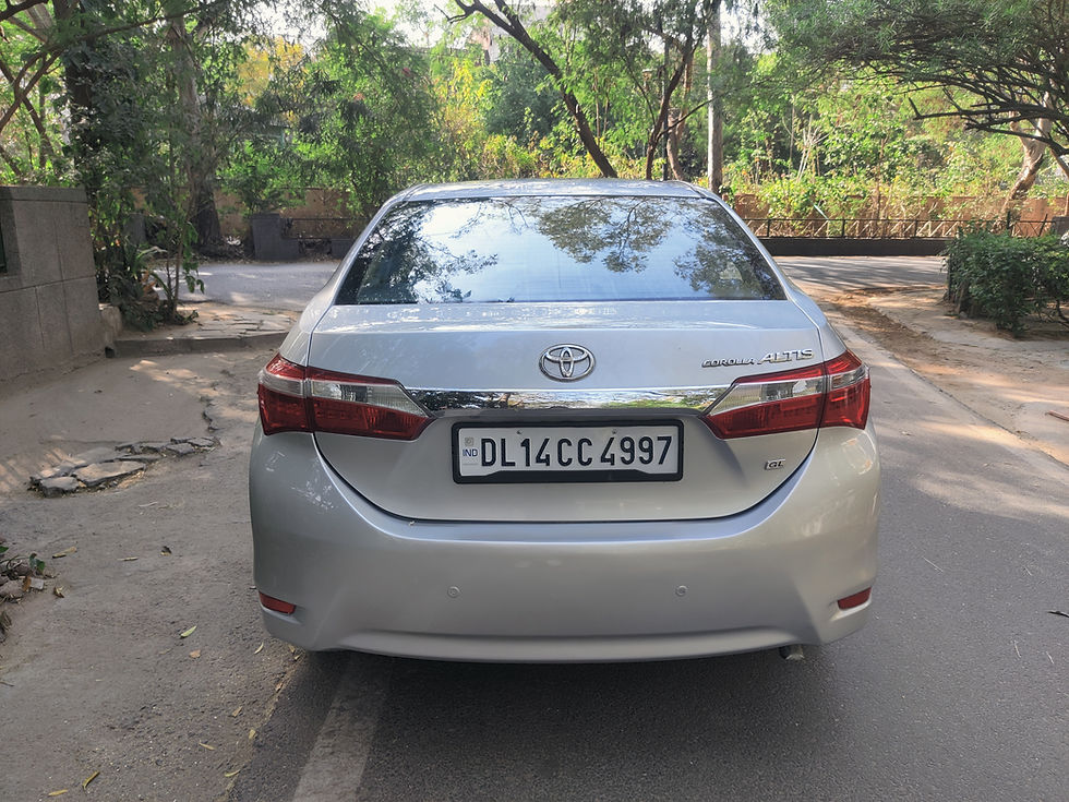 Thumbnail: Toyota Corolla G Manual (2014-2017) Back View | Certified Used Cars in Delhi, India