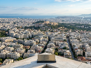 AVGLaw expert legal counsel for Greece Golden Visa 2026 restrictions, featuring the firm's logo overlooking the Athens skyline and Acropolis