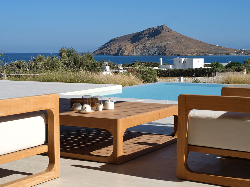 Private terrace and loung detail of TREĪS Luxury Villa Paros with pool and sea view