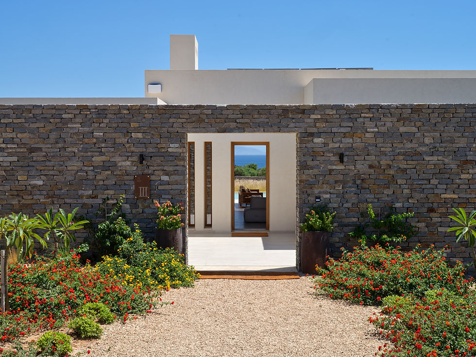 Cycladic architecture TREĪS Luxury Villa Paros stone design and entrance of Villa III