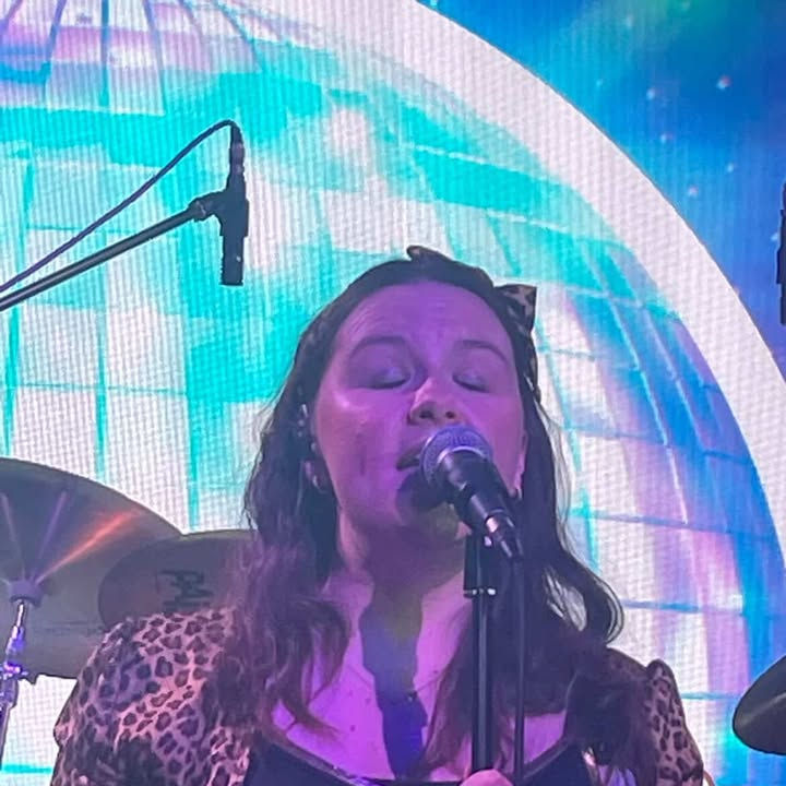 Bex singing at he Login Lounge Camberley