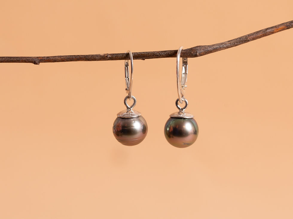 Boucles d'oreilles réalisées avec les perles que notre cliente a ramené de Polynésie