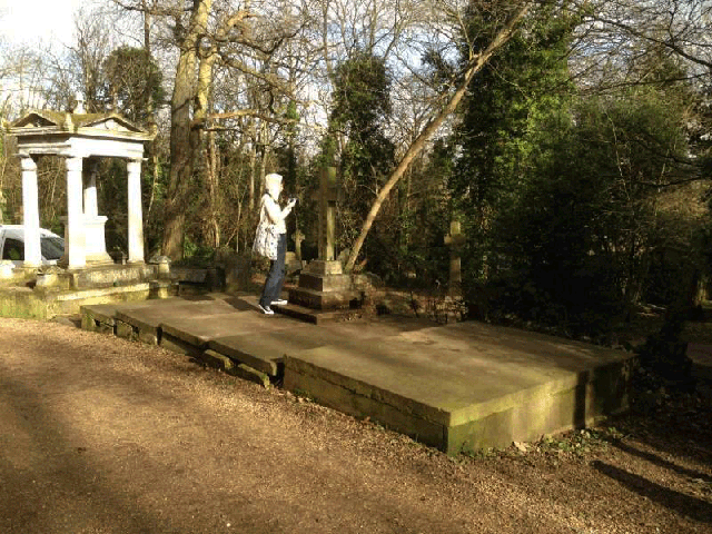 Christina atop what I'd presume are unfinished graves