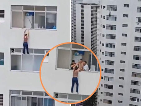 MUJER SE RESBALA LIMPIANDO VENTANAS DE UN EDIFICIO Y QUEDA COLGANDO EN BRASIL