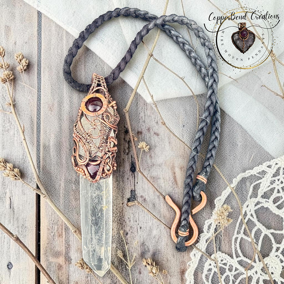 Thumbnail: Clear Quartz point with Garnet 