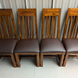 Set of four dining chair seat pads reupholstered in brown vinyl with new high-density foam, professionally restored by A2Z Upholstery in Heaton Moor Manchester