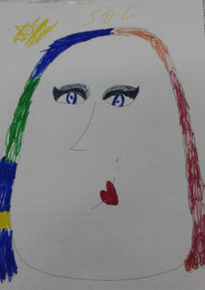 Este es mi retrato. Fue realizado por una niña con quien trabajé como acompañante escolar.