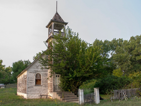 Old church, overgrown landscape