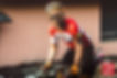 Biker in red suit and sunglasses