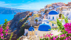 Timeless beauty: white and blue against the sparkling sea