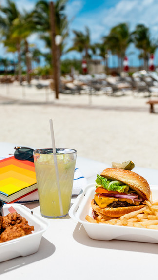 tropical paradise at Resorts World Bimini - burger and tropical drinks - a short escape with resorts world global