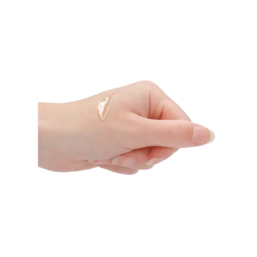 Thumbnail: Hand showing a small drop of cream or lotion on skin.