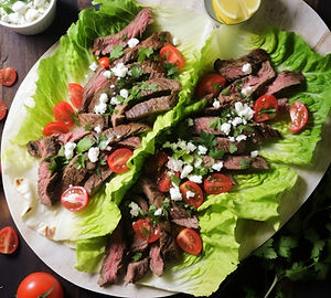 Beef lettuce wraps with leftover grilled steak, tomatoes, and queso fresco