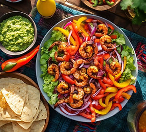 Shrimp fajitas with bell peppers, onions, and a side of guacamole (use lettuce wraps instead of tortillas for low carb)